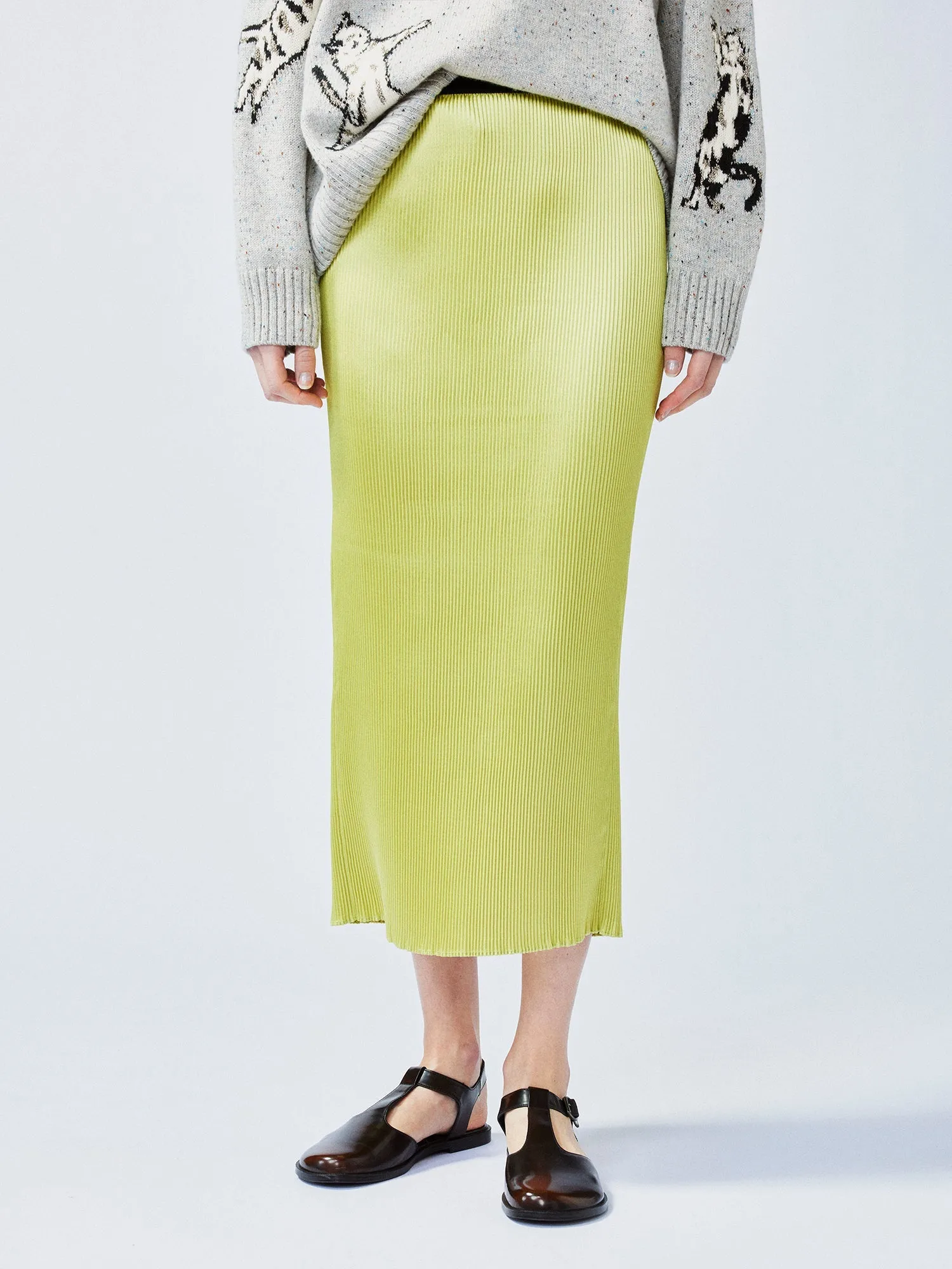 Glamorous and vibrant lime green pleated midi skirt