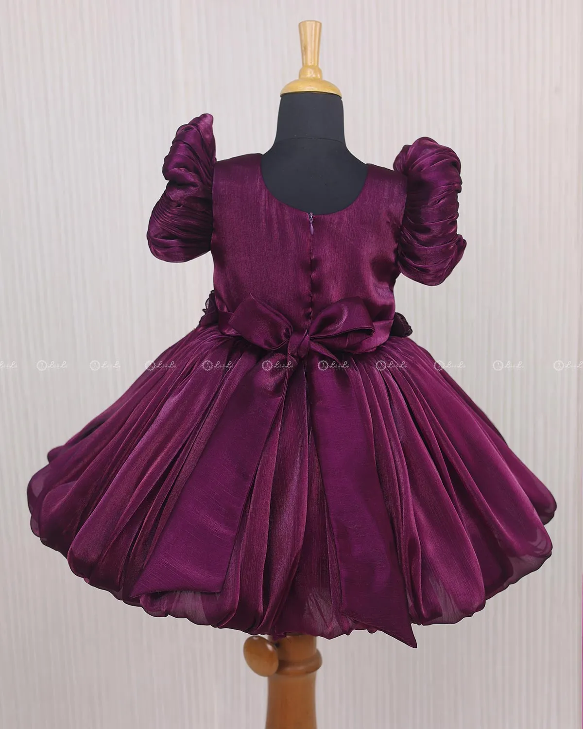 Plum Purple Balloon Gown with Handcrafted Rose Embellishment.