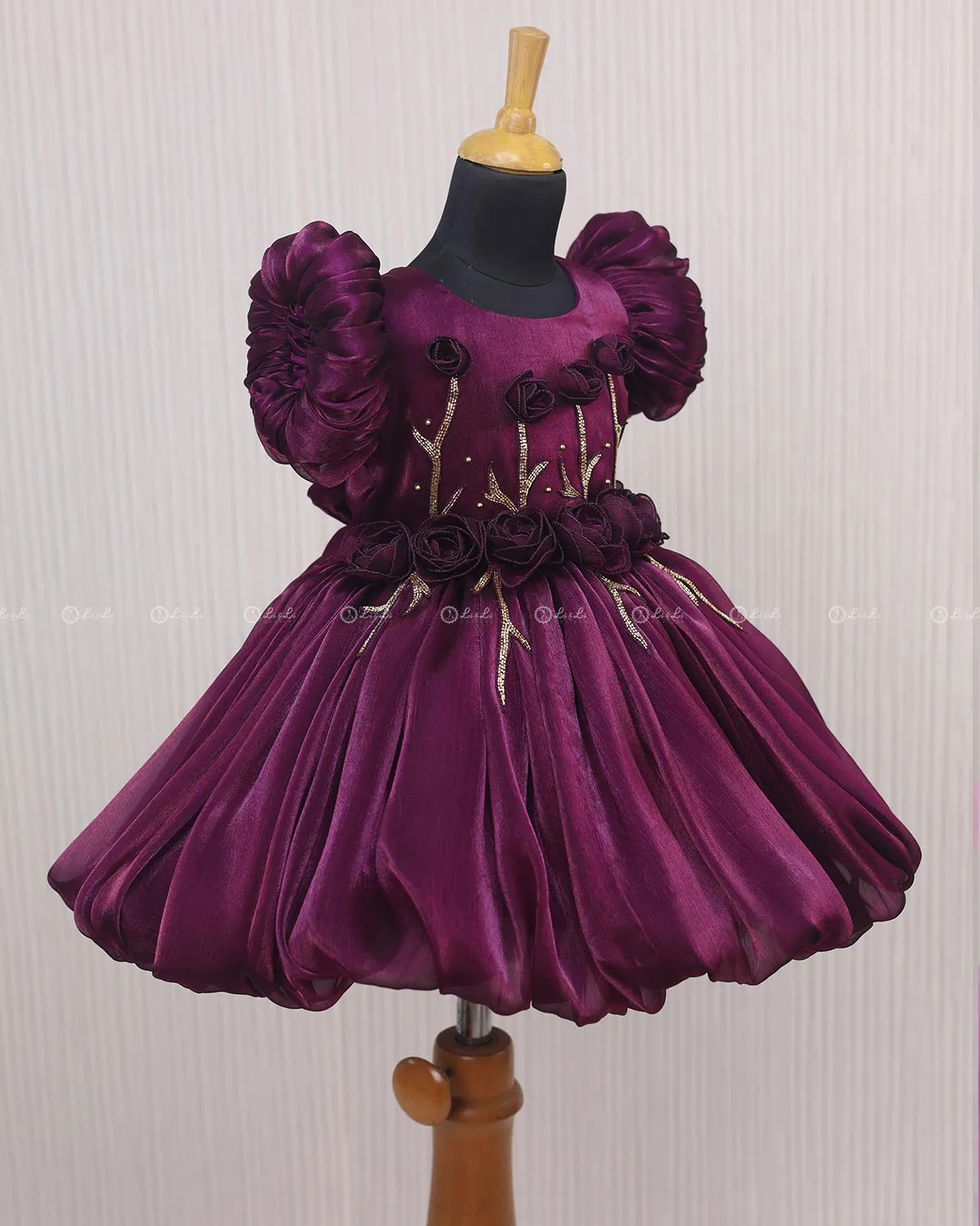 Plum Purple Balloon Gown with Handcrafted Rose Embellishment.