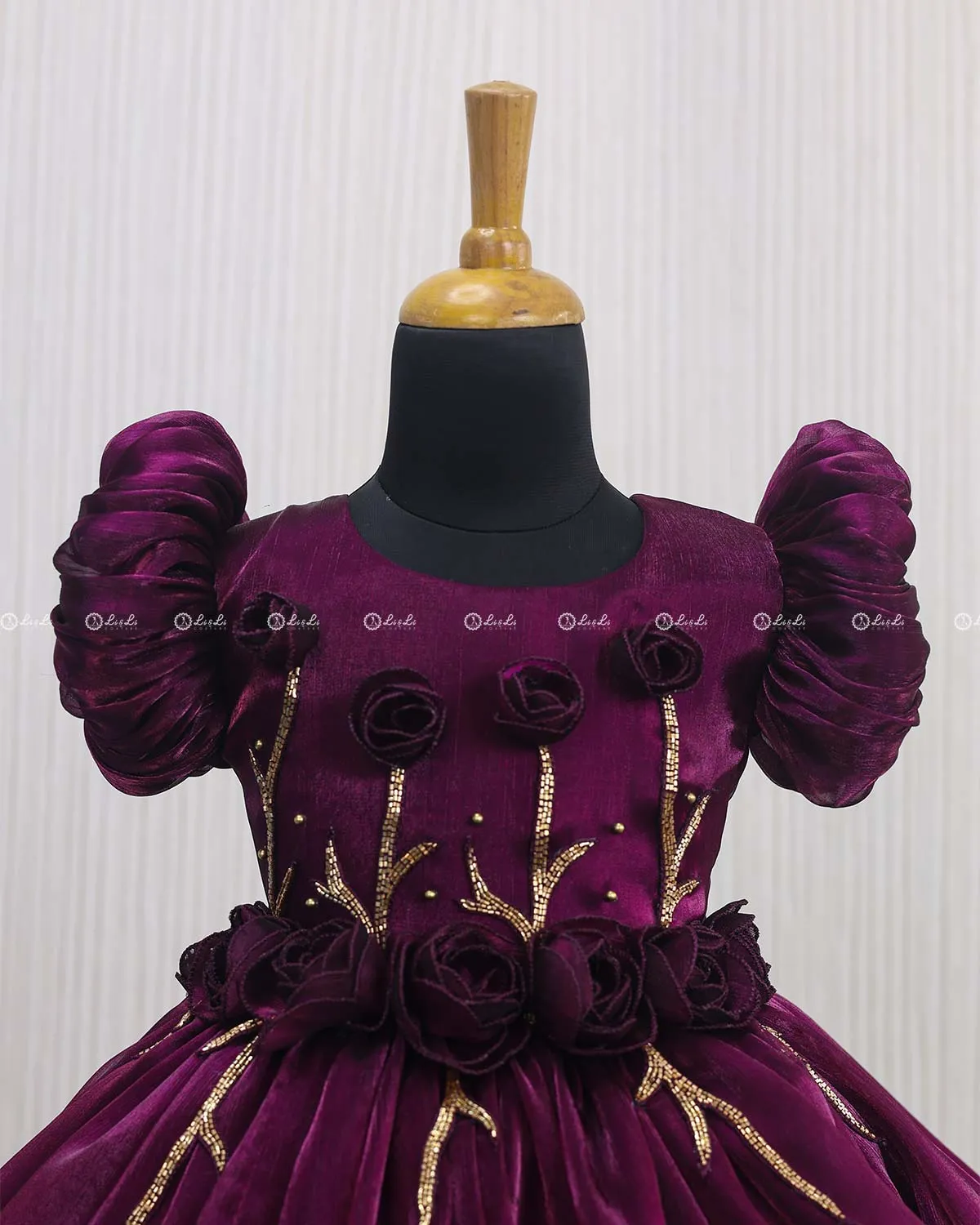 Plum Purple Balloon Gown with Handcrafted Rose Embellishment.