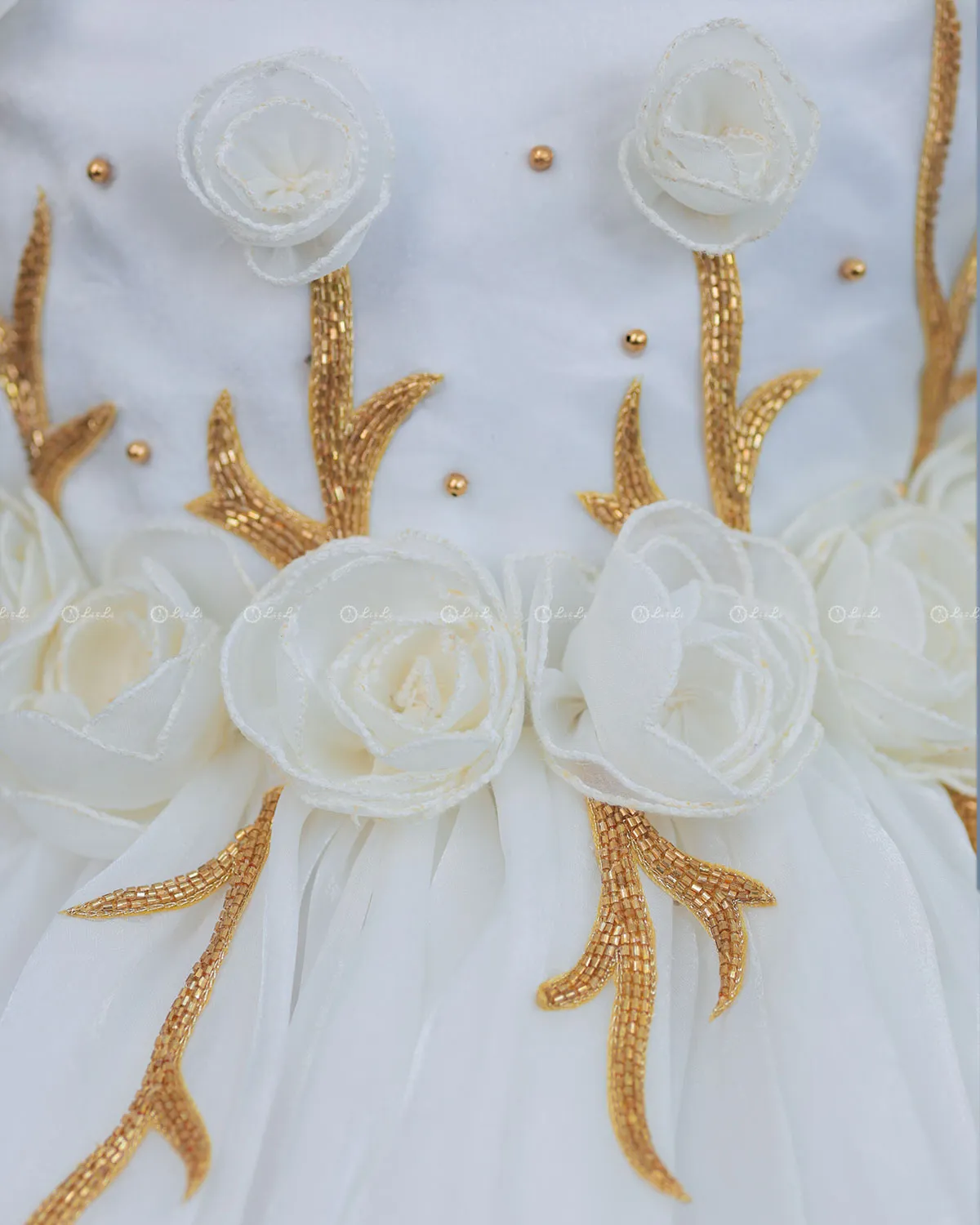 White Balloon Gown with Handcrafted Rose Embellishment.